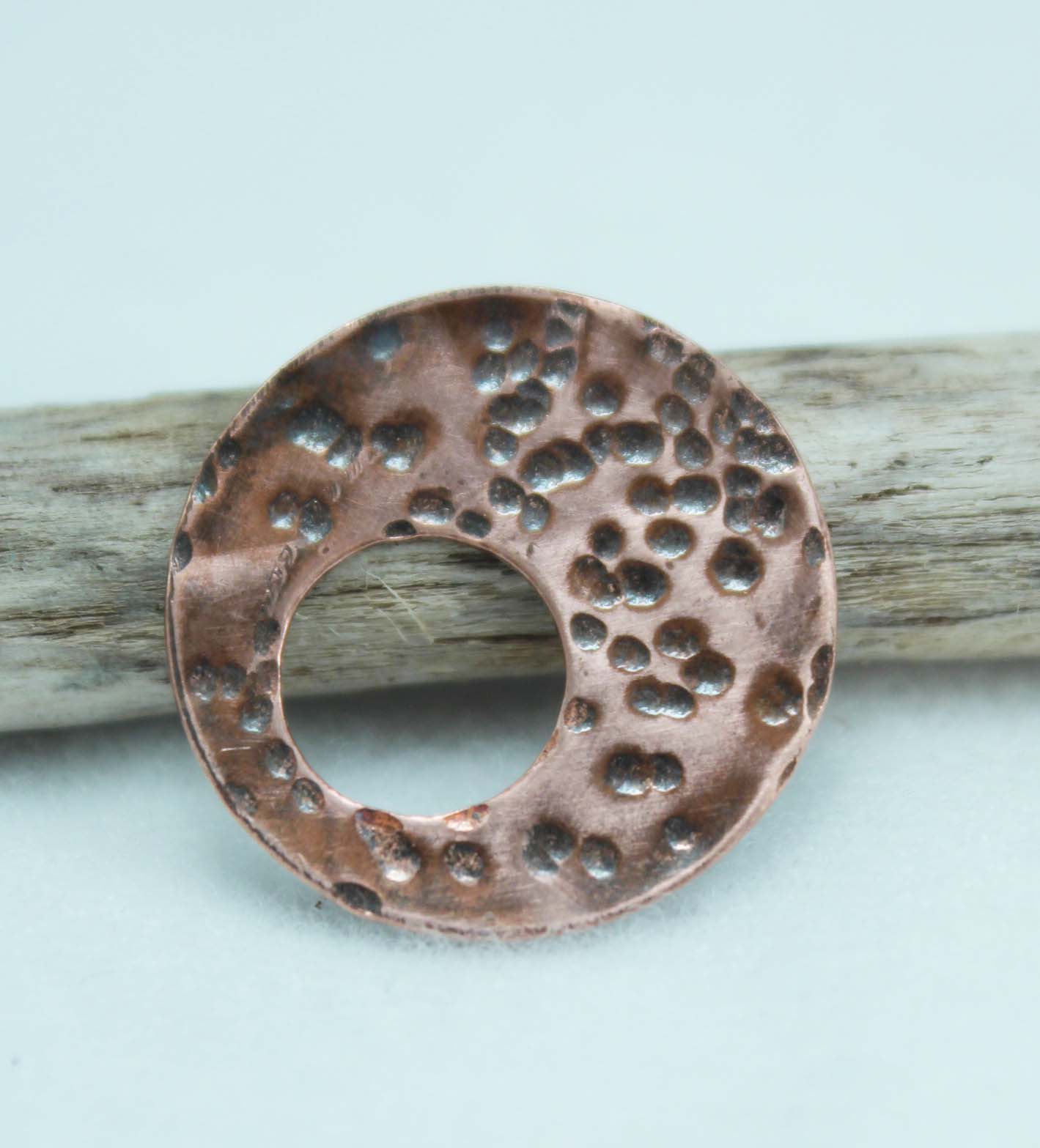 Textured copper disc, textured using a small ball peen hammer