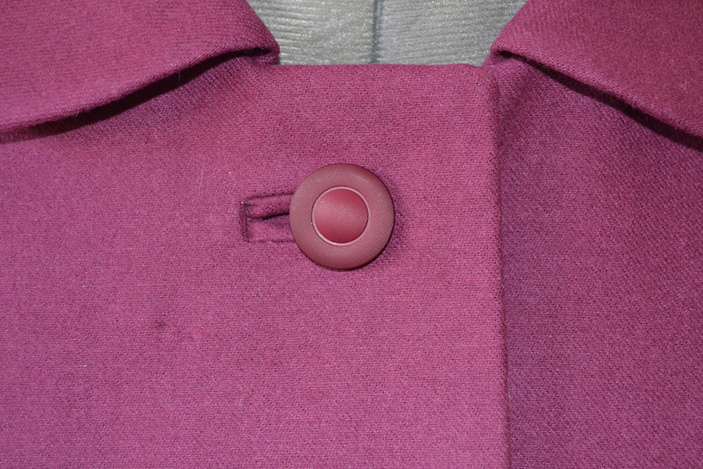 bound buttonhole on pink jacket