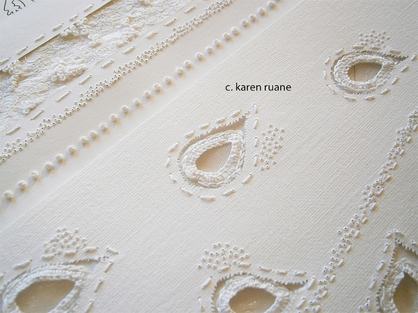 white embroidery on white paper