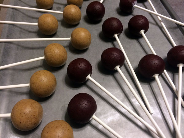 add sticks to cake balls