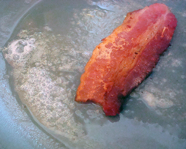 Bacon in hot pan