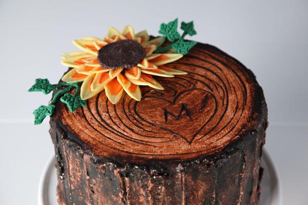 Sunflower and tree trunk cake by Bluprint instructor Erin Gardner