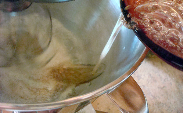 Syrup into nougat mixture