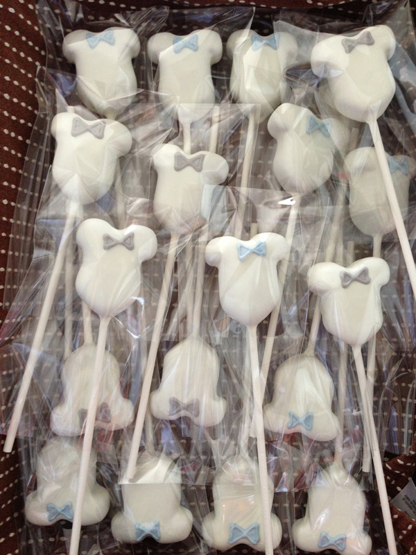 cake pops with gray and blue