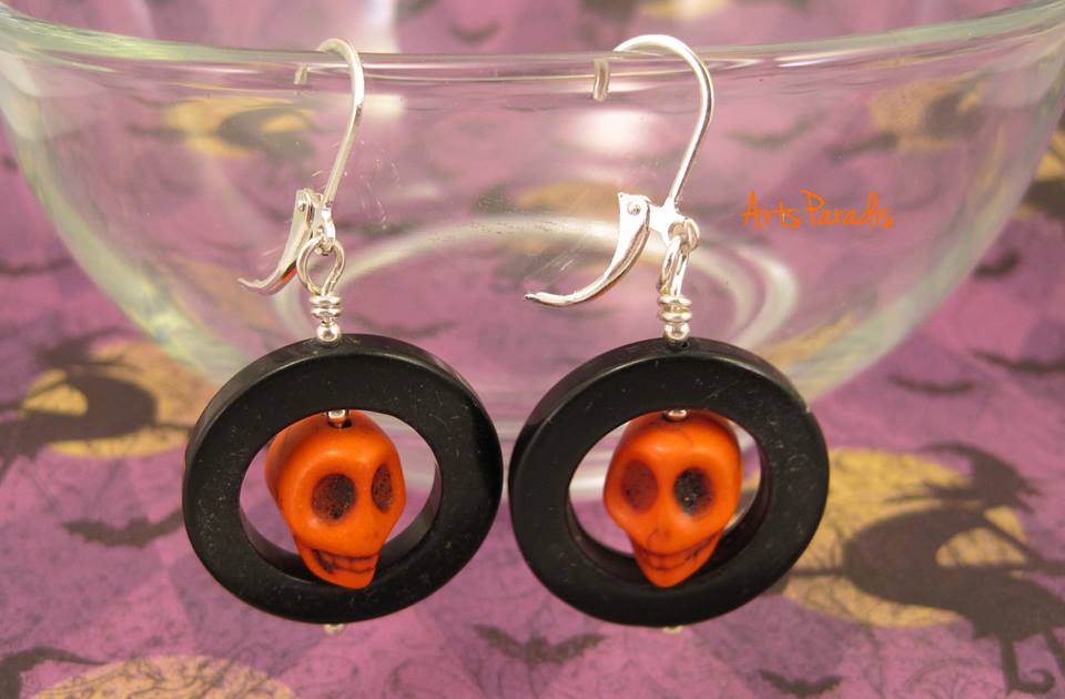 Orange skull earring handmade by Charlene Wood