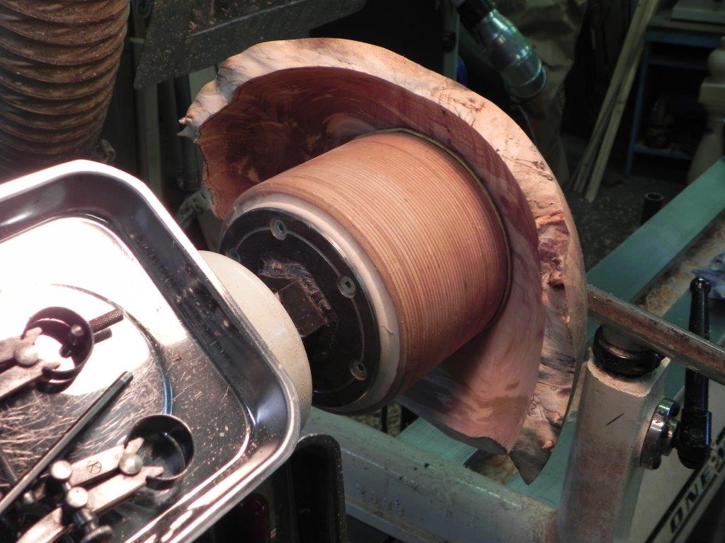 Photo shows bowl held in a vacuum chuck - Creating a jam chuck to hold this bowl to finish turn the foot would be very involved and probably take longer to create than the bowl itself