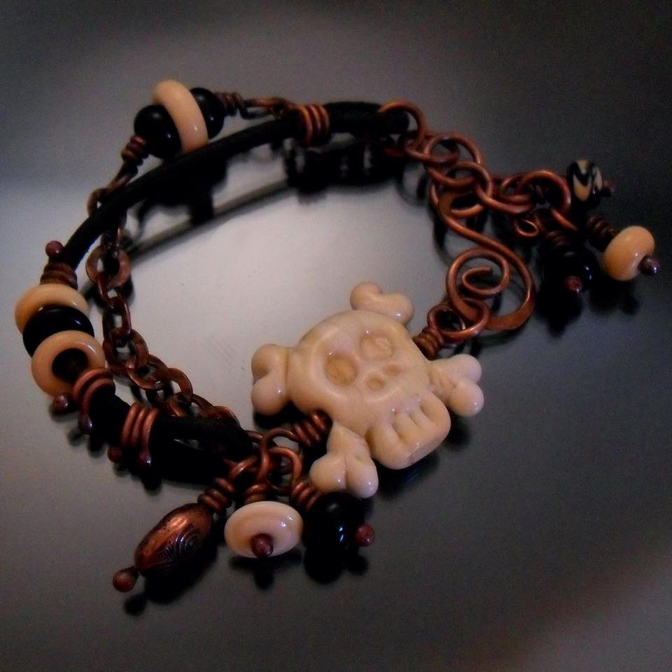 Lampwork skull bracelet handmade by Tracy Bell