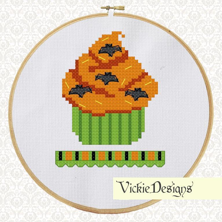 cross stitch pattern of a halloween cupcake with orange frosting and green case.