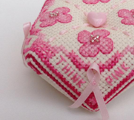 pink breast cancer awareness cross-stitched biscornu pin cushion