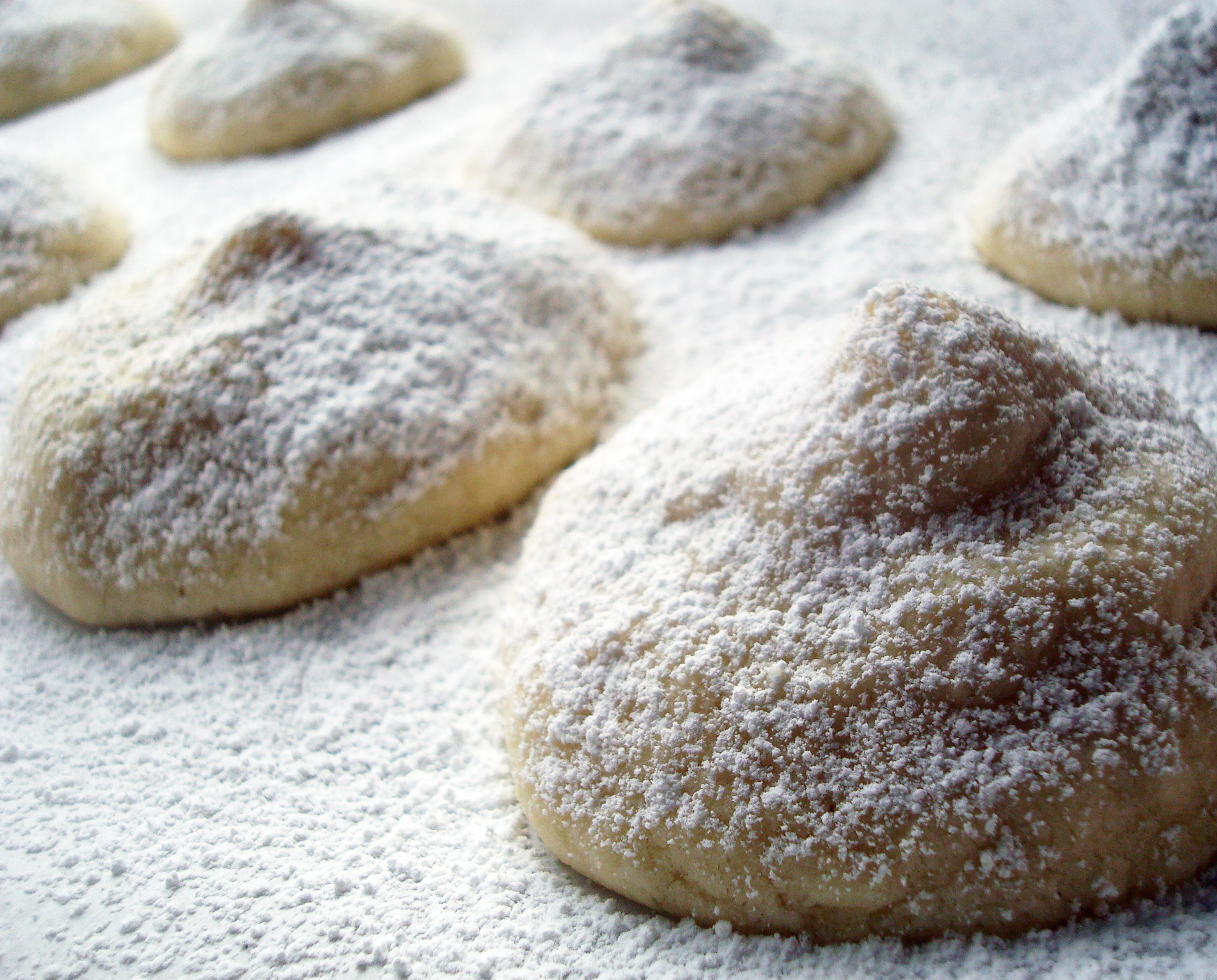 Filled cookies with sugar on top