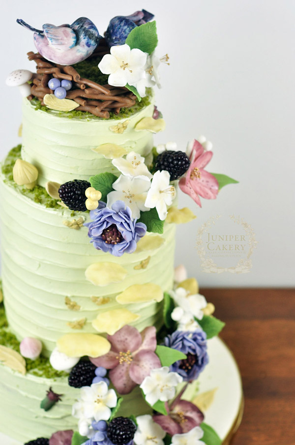 Rustic buttercream wedding cake with woodland florals by Juniper Cakery