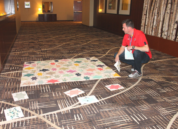 Man Making a Quilt at Sewtopia Event