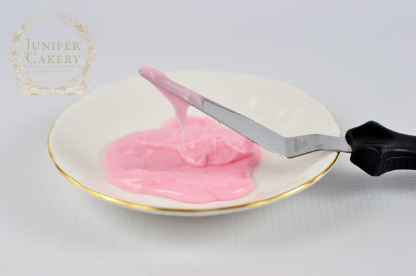 Patch up cracks in fondant with a water and fondant paste mix