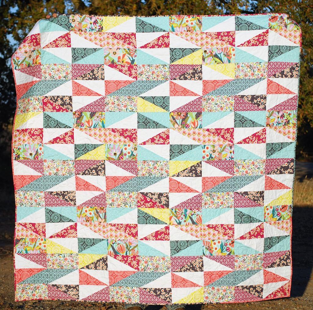 patchwork quilt with rectangles and triangles