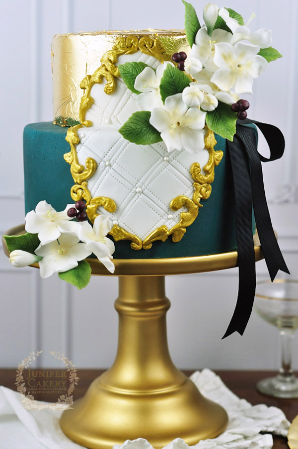 Gold painted frame cake by Juniper Cakery