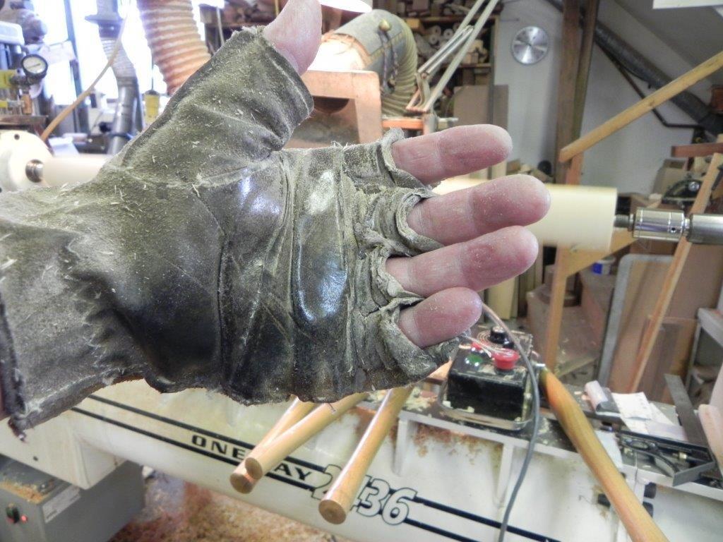 Gloved hand - Glove used for traveling steady rest.