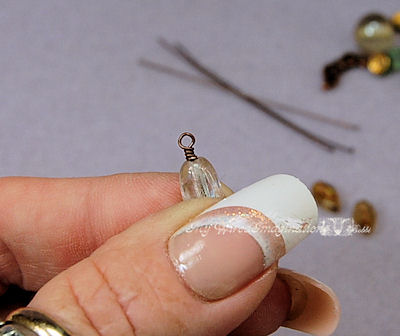 Neatly trim the wire next to the bead
