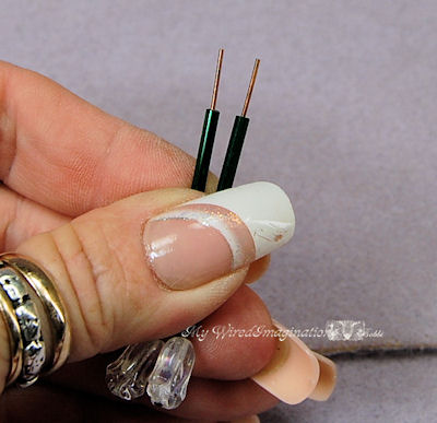 Trim the wire above the bugle beads