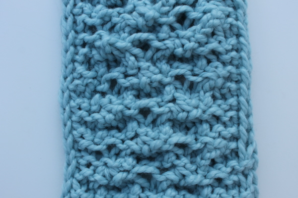 Knitting an elongated stitch