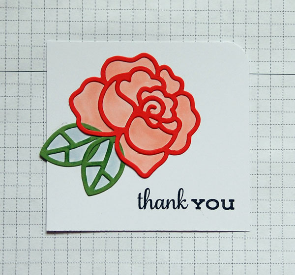 Step 1 Color open spaces of die-cut rose