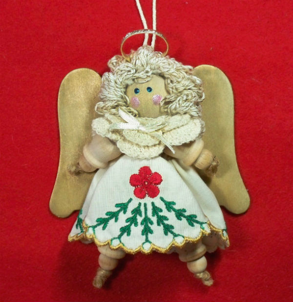 spool angel with cutwork edge embroidered skirt