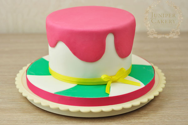Fake fondant pink drizzle detail for a candy themed cake by Juniper Cakery