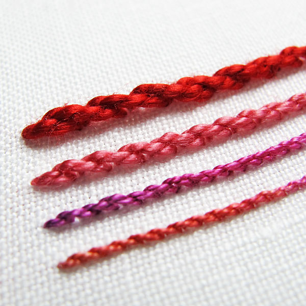 Embroidery stitch samples in red perle thread
