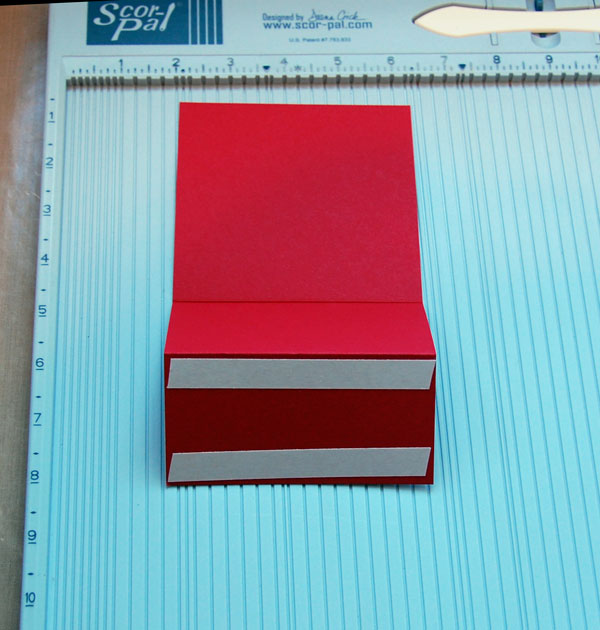 Double-sided tape adhered