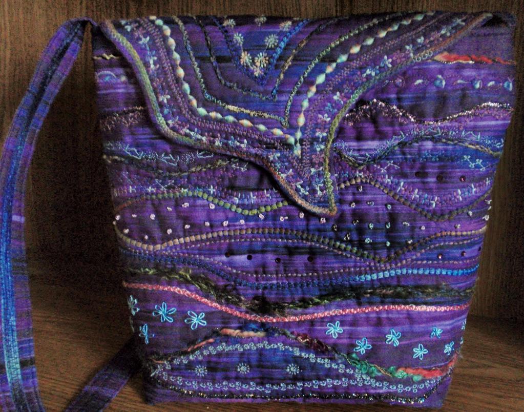 Purple Bag With Stitched Embellishments