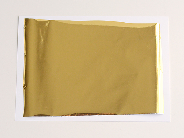 Gold Foil Covering a Card Template