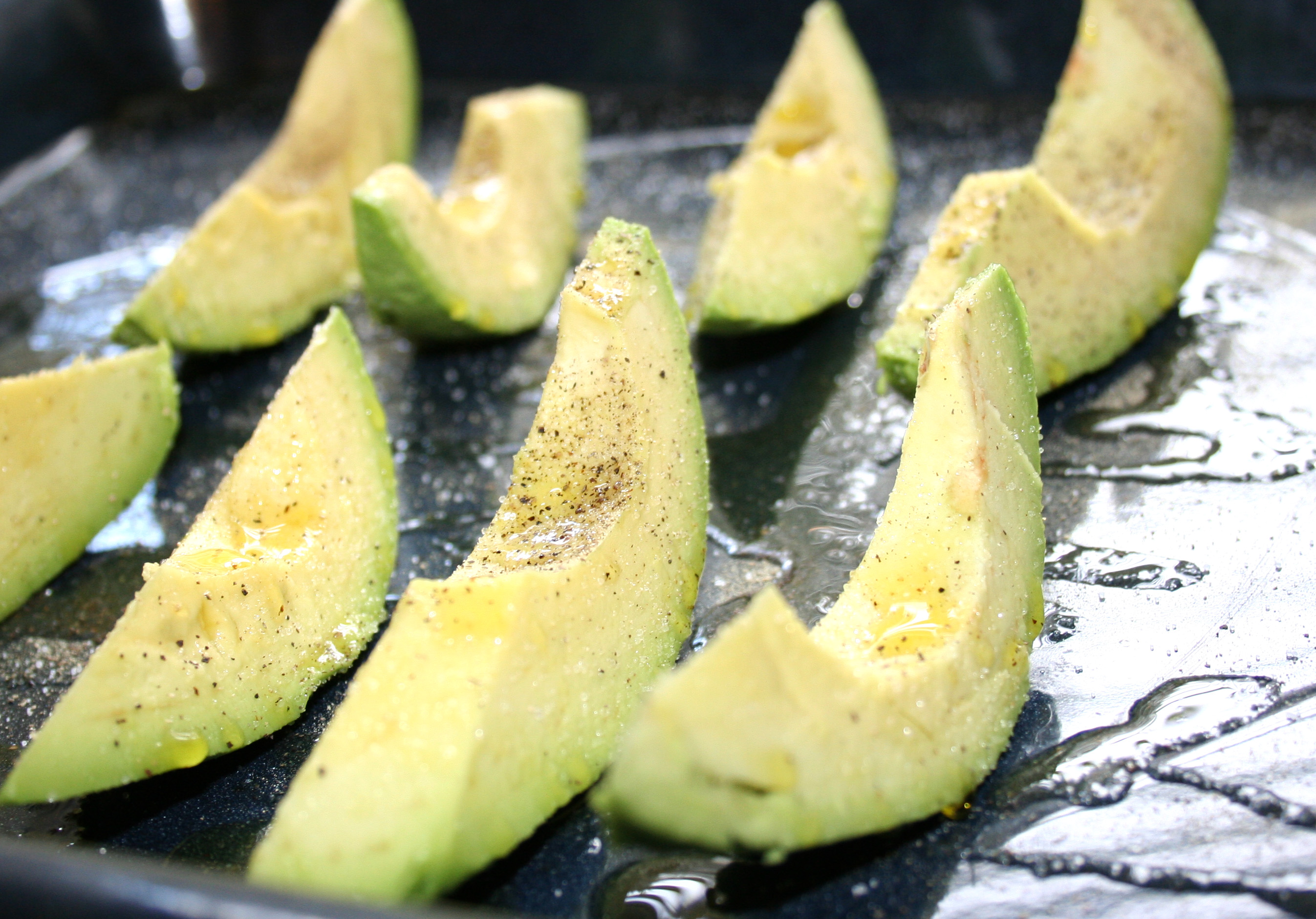 Sliced avocado with seasoning