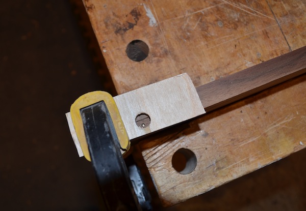 a clamping block with an appropriate sized hole