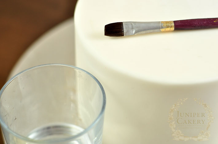 Add edible gold leaf to cakes for a luxurious look