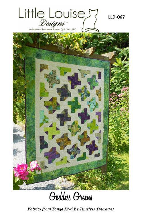 green spinning blocks pieced quilt