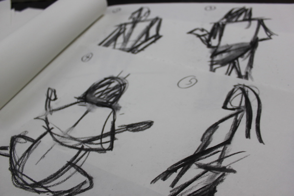 People in motion with charcoal - drawing