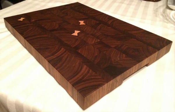 walnut board with maple butterflies