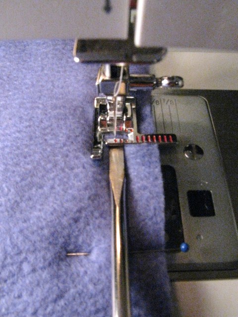 flat-head screwdriver to help with sewing