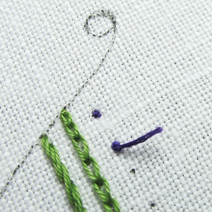 work another tiny stab stitch over the first, like a tiny cross stitch