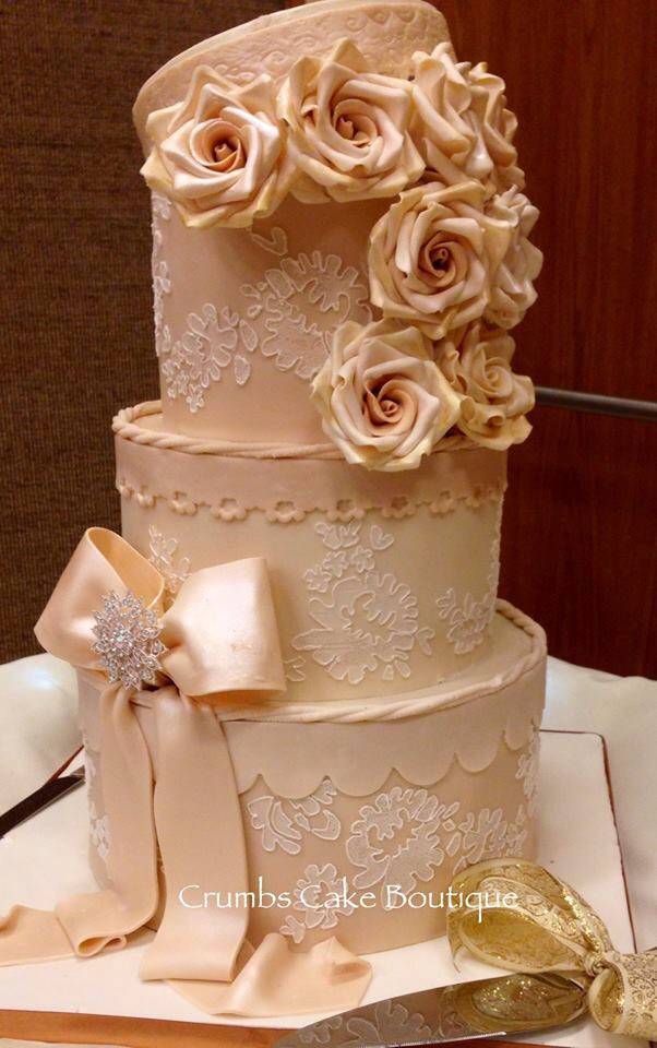 Vintage ivory hat box cake for a wedding by Bluprint member Crumbs Cake Btq