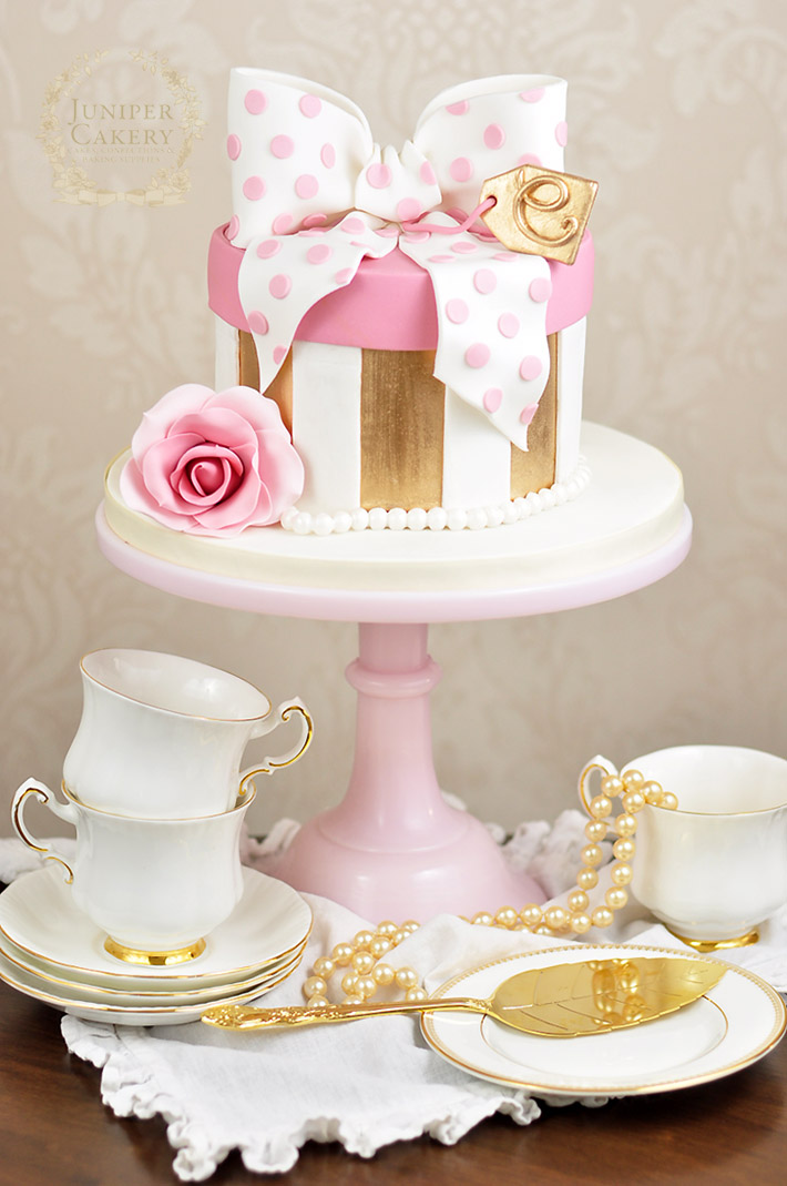 Gold and pink polka dot bow hat bow cake by Juniper Cakery