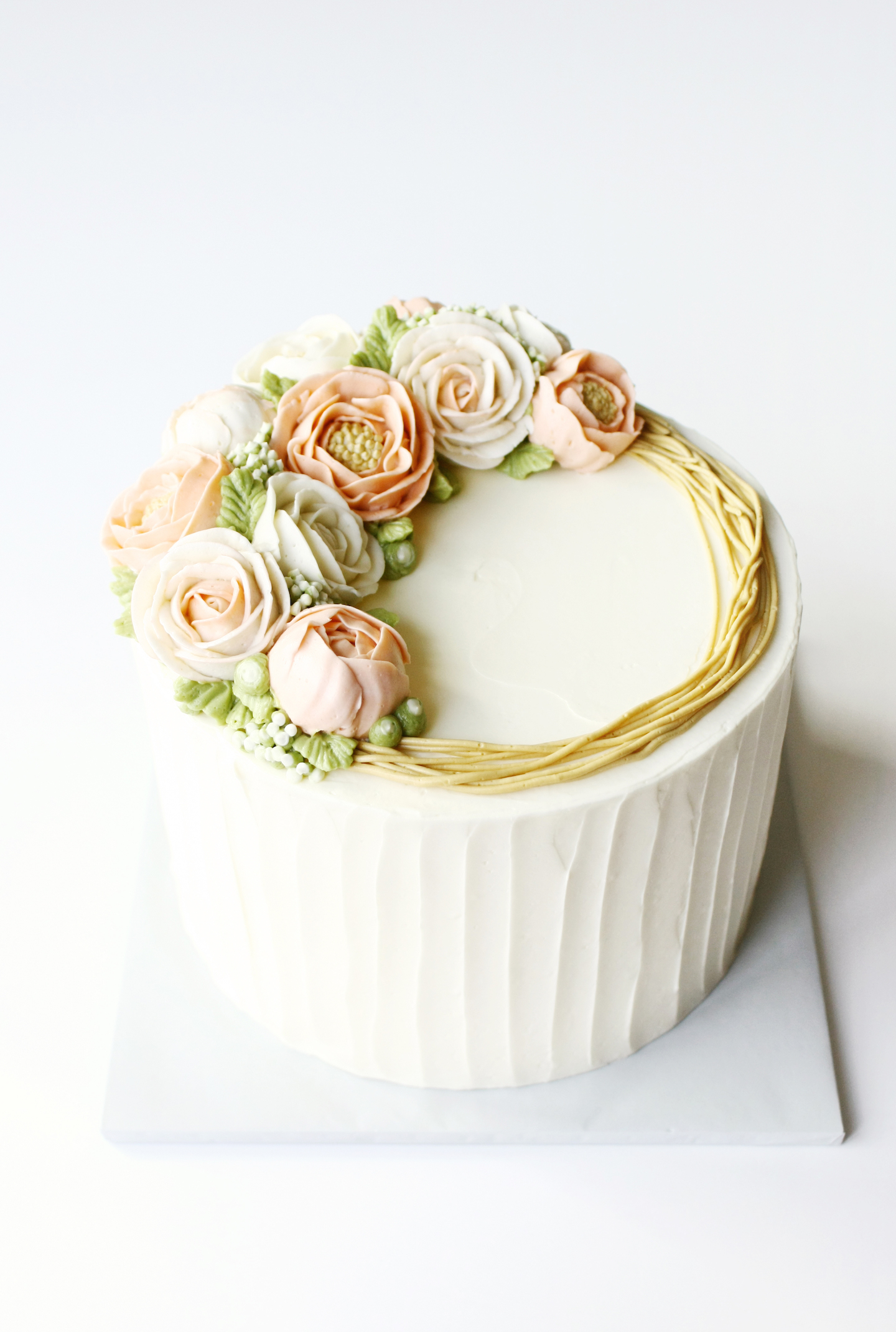 Piped Buttercream Flowers by Liz Shim | Erin Gardner | Bluprint