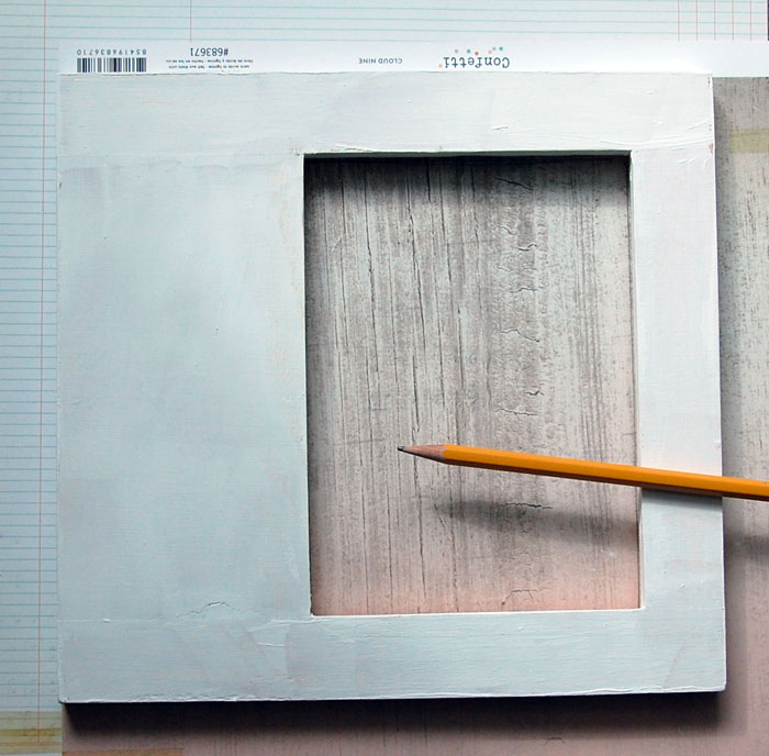 Trace frame onto patterned paper; cut along pencil lines