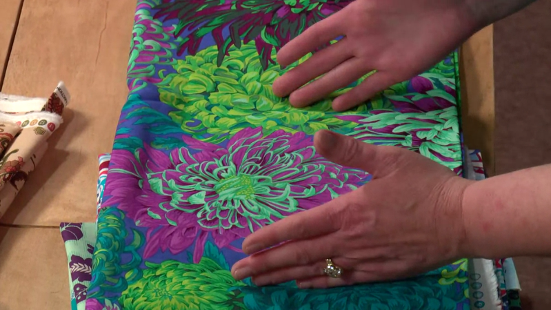 Comparing fabric print to hand size