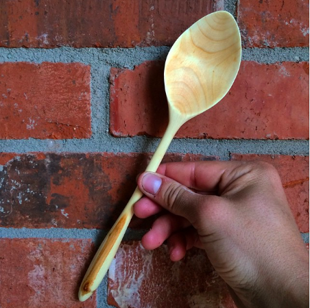 finished product: A green wood carved spoon made from cherry wood