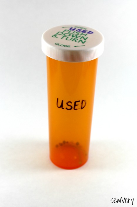 Pill bottle for used sewing pins and needles