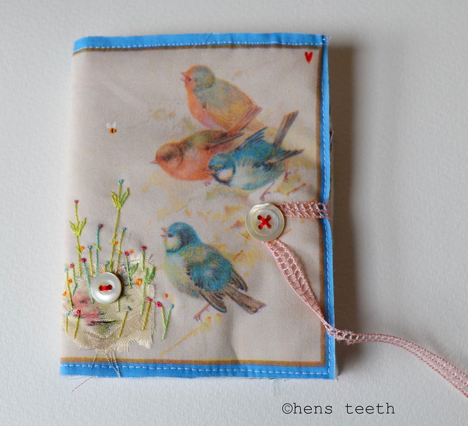 Hens Teeth using printed fabric over stitched and made into a needle case.