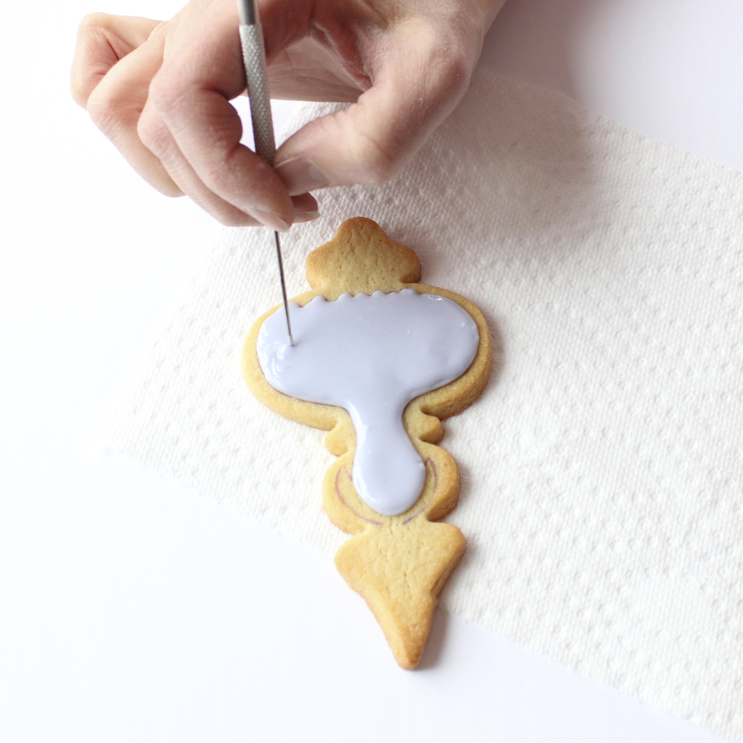 smoothing the flooded icing