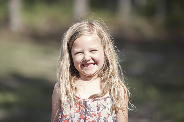 photo of girl squinting with double chin