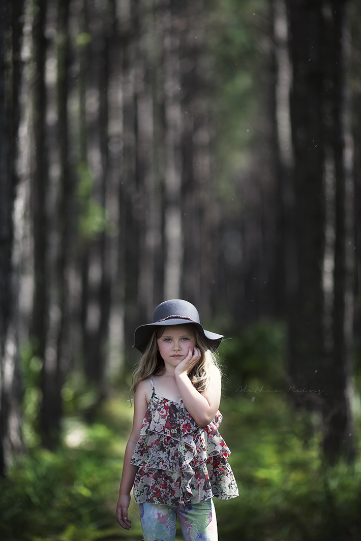 final edit of photo of girl resting one hand on her face