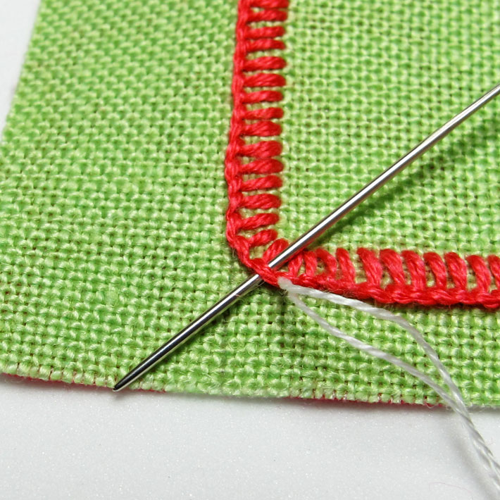whip the twisted edge of the buttonhole stitches